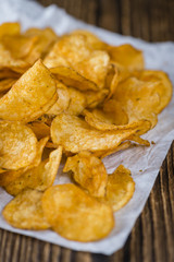 Portion of crispy Potato Chips (selective focus)