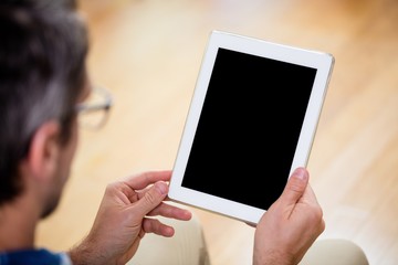 Man using a digital tablet