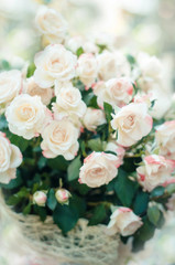 Large bouquet in a basket of delicate roses