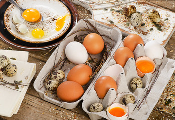 Eggs on the wooden table.