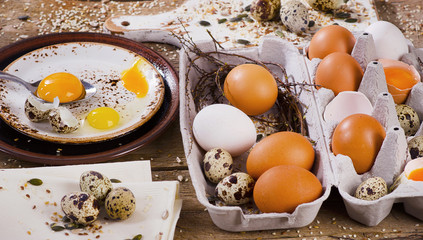 Eggs on a wooden board.