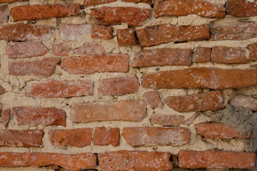 Old brick wall. Apply color and lighting effects. Vignetting. Picture a limited area of field....