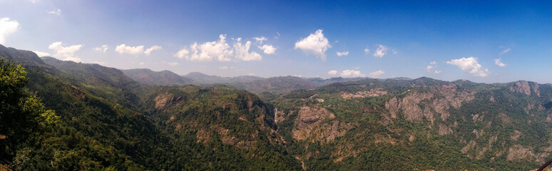Wide panoramic view of green mountain from western ghats