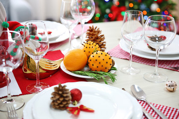 Christmas table setting with holiday decorations