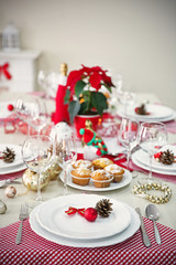 Christmas table setting with holiday decorations