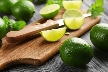 Fresh limes on cutting board