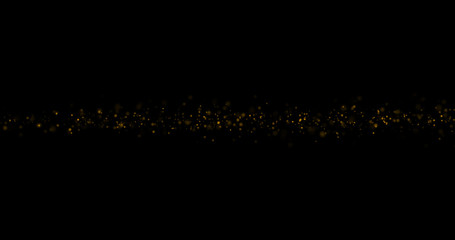 Fototapeta na wymiar Gold glitter on a black background