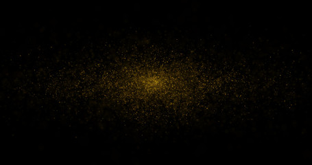 Fototapeta na wymiar Gold glitter on a black background