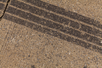 Tire tracks on road
