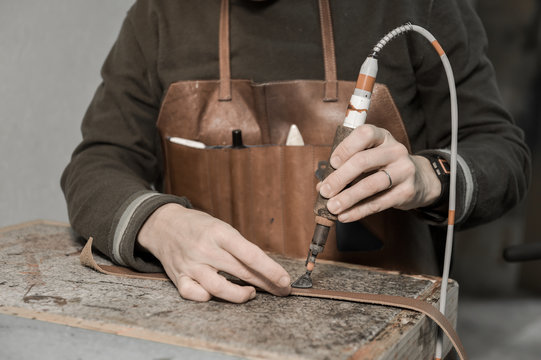 Trunk Maker at work in his luxury leather workshop