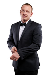 Businessman isolated over white background, smiling.