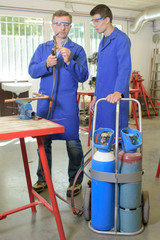 Plumbing lesson with welding station - obrazy, fototapety, plakaty