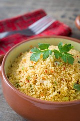 Couscous with vegetables on morocco cloth

