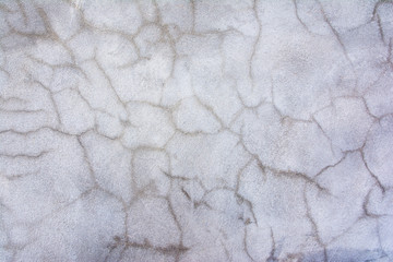 Grunge concrete cement wall with crack wall background