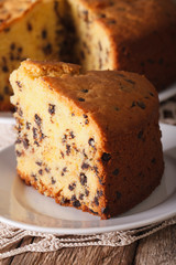 A piece of biscuit pie with chocolate Drops macro on a plate. Vertical
