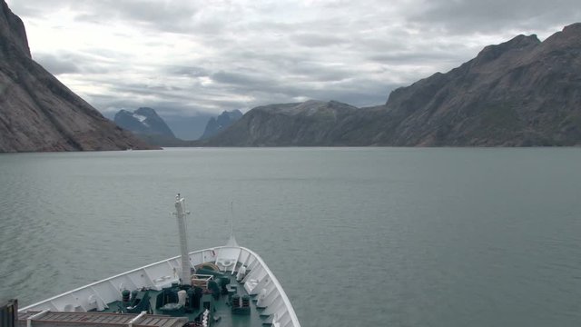 View across the bow of a ship transiting Prince Christian Sound, Greenland