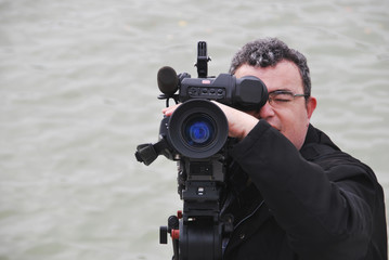 Videographer with camera