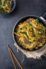 Chinese food. Beef chow mein on slate
