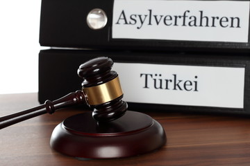 Asylsymbol mit Ordnern