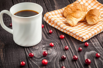 small croissants and cup of coffee