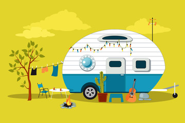Cartoon travelling scene with a vintage camper, a fire pit, camping table and laundry line, EPS 8 vector illustration, no transparencies - obrazy, fototapety, plakaty