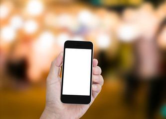Hand holding blank screen mobile phone with blur abstract backgr