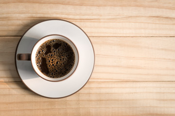 Coffee cup on a wood background., Flat lay.