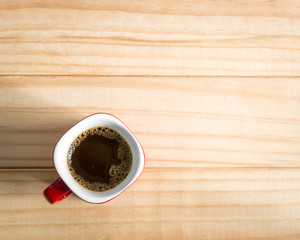 Coffee cup on a wood background., Flat lay.