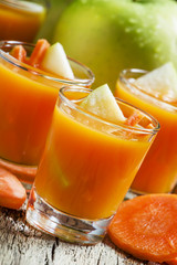 Freshly squeezed juice of carrots and green apples, selective fo