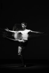 Fototapeta na wymiar Ballet dancer in black