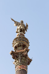 Fototapeta na wymiar Monument of Christopher Columbus pointing towards America during golden sunset in Barcelona, Catalonia, Spain