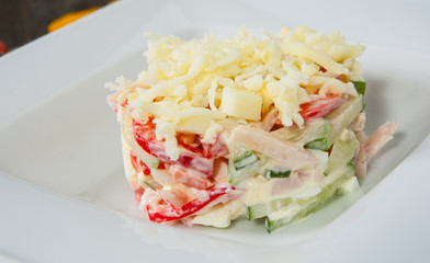 salad with cheese, vegetables, egg, ham