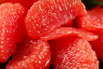 Juicy pieces of grapefruit, close up