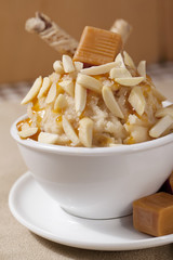 caramel ice cream with peanuts and caramel candy