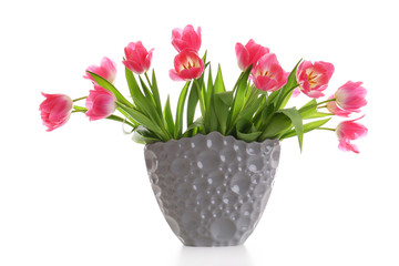 Fresh bouquet of tulips in a vase isolated on white