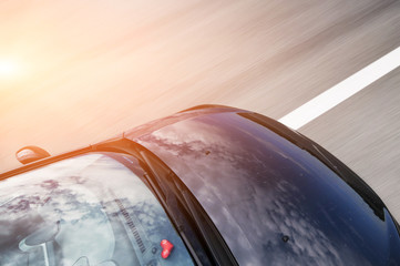 A car driving on a motorway at high speeds