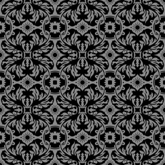 Elegant dark antique background image of spiral leaf round flower