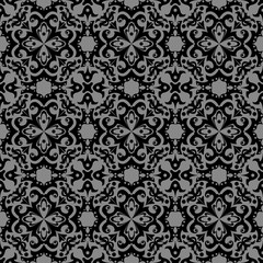 Elegant dark antique background image of round spiral kaleidoscope flower pattern.
