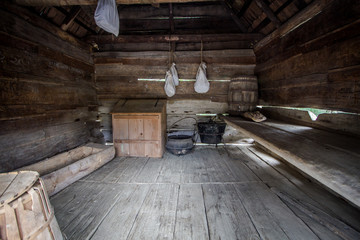 Fototapeta na wymiar One Room Shack. Interior of a one room pioneer cabin located in the Great Smoky Mountains National Park. Gatlinburg, Tennessee.