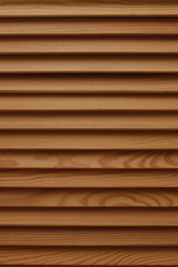 Shield with a large number of parallel wooden logs texture. Wood blinds.