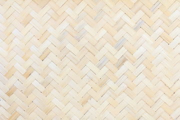 Closeup brown bamboo weaving texture, Woven wood pattern of thai