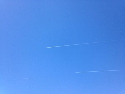 Two Jets In Clear Blue Sky