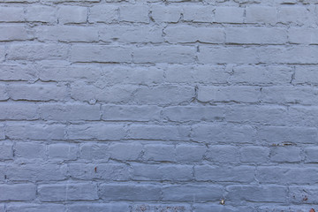 Brick wall with blue paint