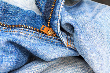 Closeup Blue jeans texture with zipper.