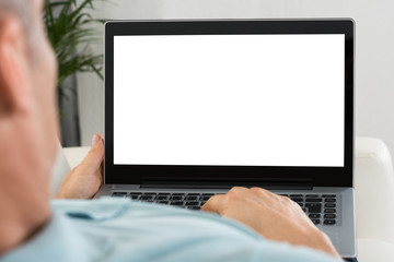 Person Holding Laptop With Blank Screen