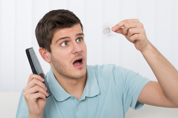 Man Suffering From Hair Loss