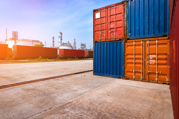 Shipping and Industry scene with Container, Frieght Train and oil refinery plant in background. added rim light