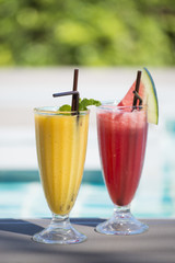 fresh fruit smoothies in glasses