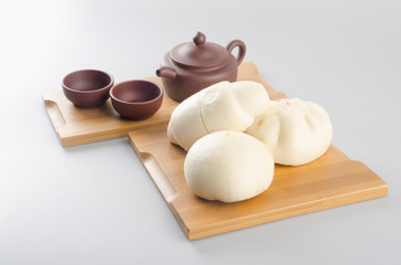 pao or mantou chinese steamed bun on a background.