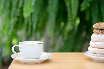 cup of coffee with brad cookie